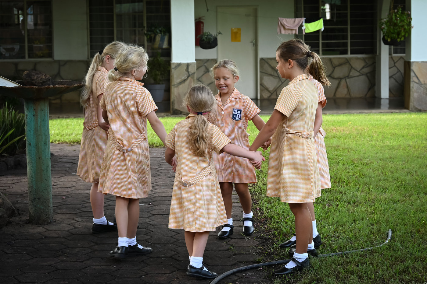 Junior phase children on the lawn